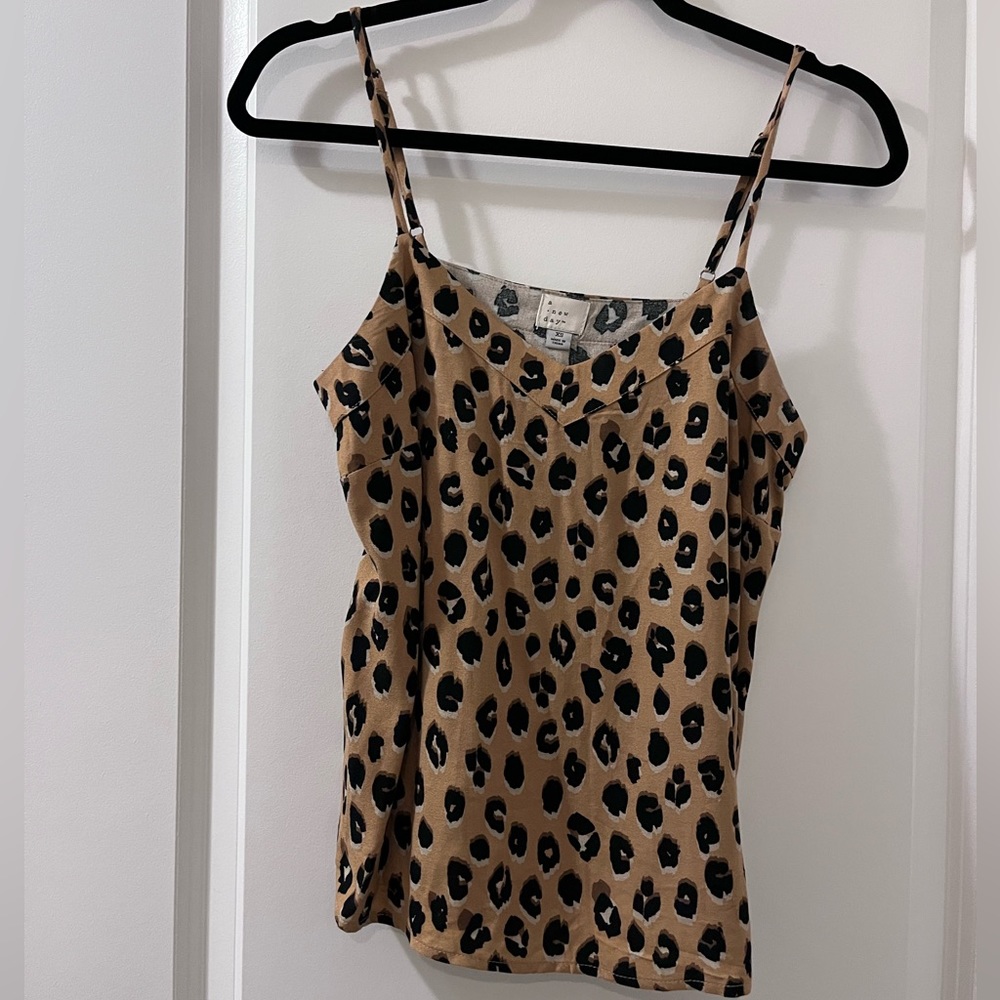 A new day tank top . Size XS. Never worn